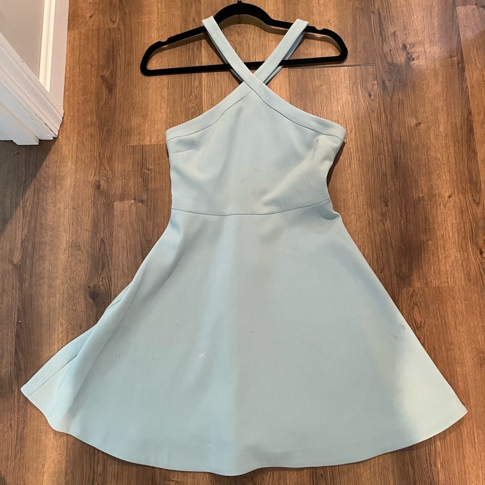Likely light blue a line dress